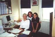 Barbra, Wendy, and Caroline looking  after the office