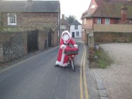 Postman Martin as Santa in Ash